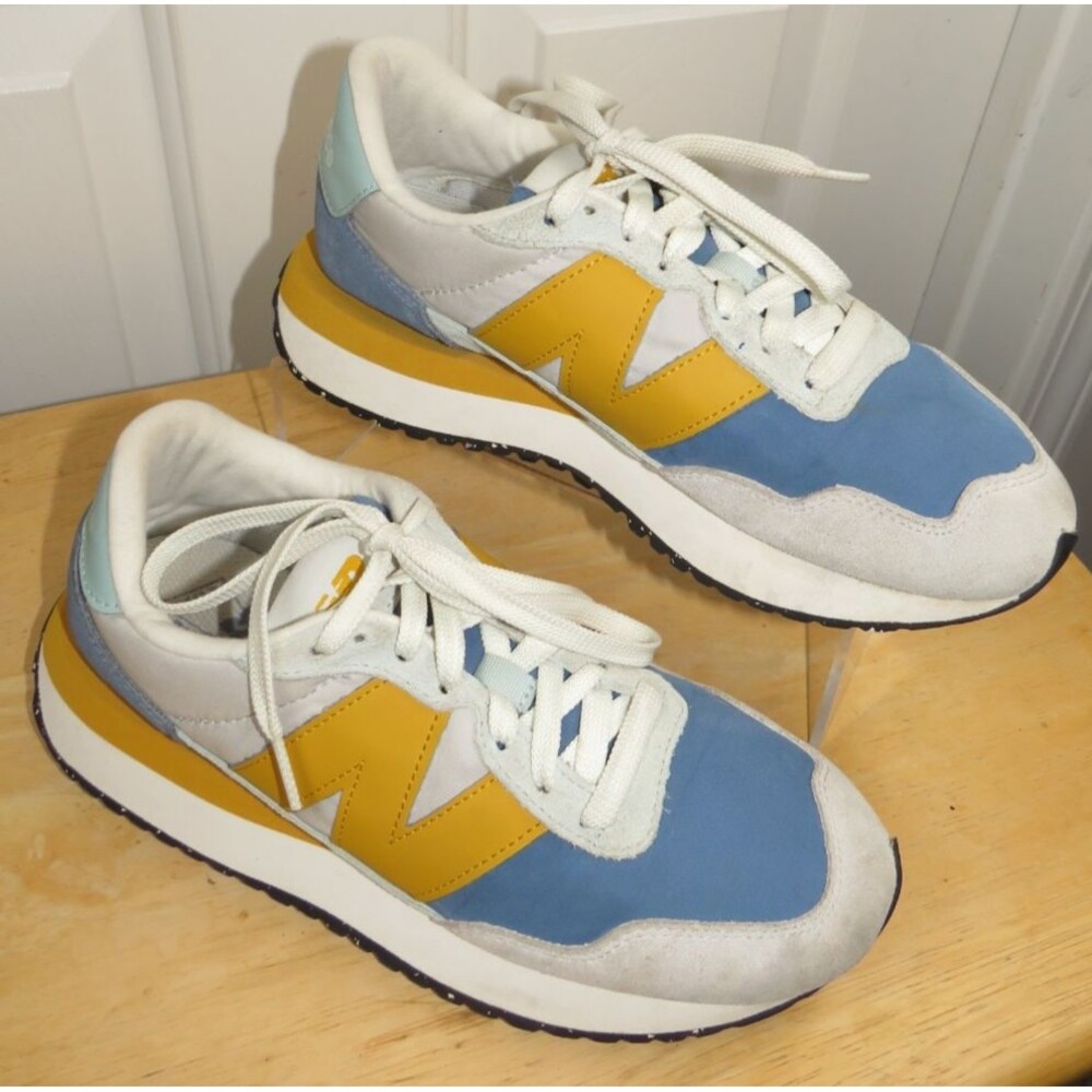 New Balance Women's 237 V1 Sneaker Mercury Blue/Winter Fog/Gold Fusion Size 8B